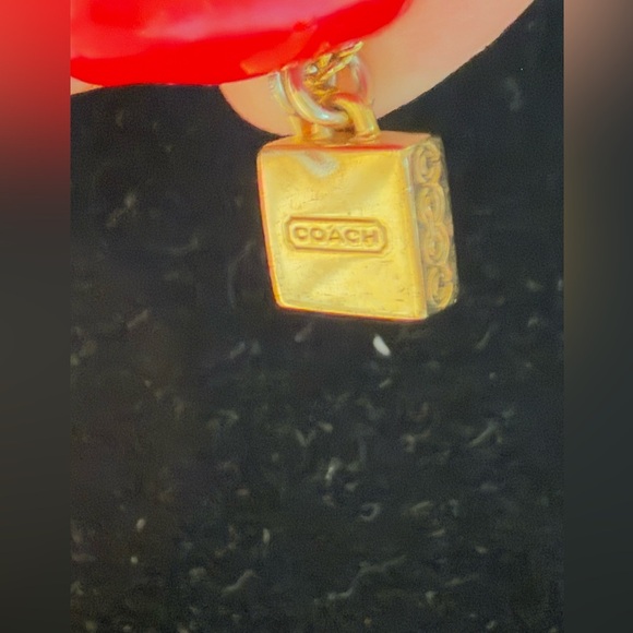 Coach gold tone necklace. Dangly gem with gold around with coach tag. - Picture 5 of 6